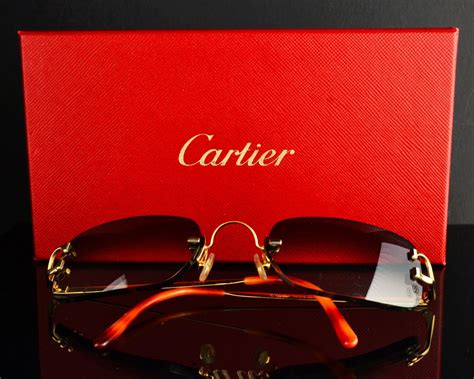 cartier glasses de sol.